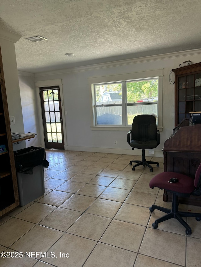 1103 Palm Cir, Jacksonville Beach, FL 32250 - office area featuring a textured ceiling, baseboards, visible vents, ornamental molding, and light tile patterned floors