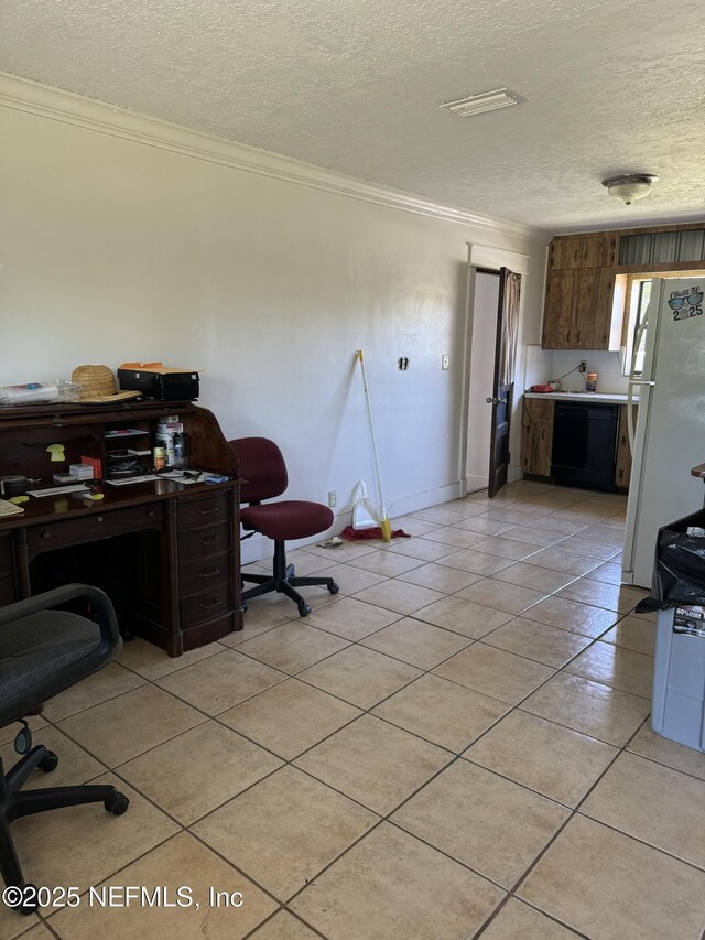 1103 Palm Cir, Jacksonville Beach, FL 32250 - office area featuring light tile patterned floors, a textured ceiling, and ornamental molding