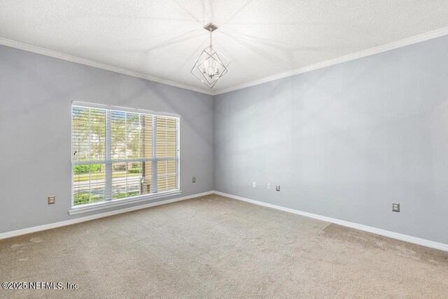 7800 Point Meadows Dr Unit 123, Jacksonville, FL 32256 - empty room with ornamental molding, carpet, and a notable chandelier