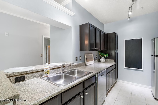 7800 Point Meadows Dr Unit 123, Jacksonville, FL 32256 - kitchen with light countertops, light tile patterned floors, stainless steel appliances, baseboards, and a sink