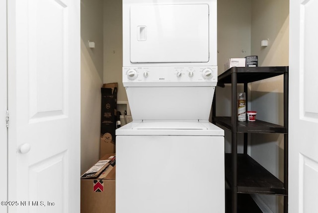 7800 Point Meadows Dr Unit 123, Jacksonville, FL 32256 - clothes washing area with stacked washer and dryer and laundry area