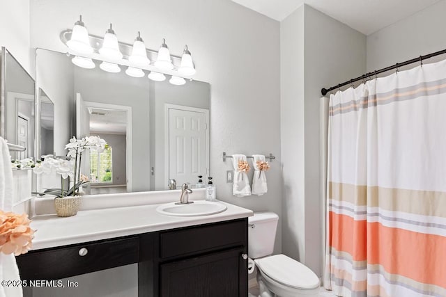 7800 Point Meadows Dr Unit 123, Jacksonville, FL 32256 - full bathroom featuring a shower with shower curtain, toilet, and vanity