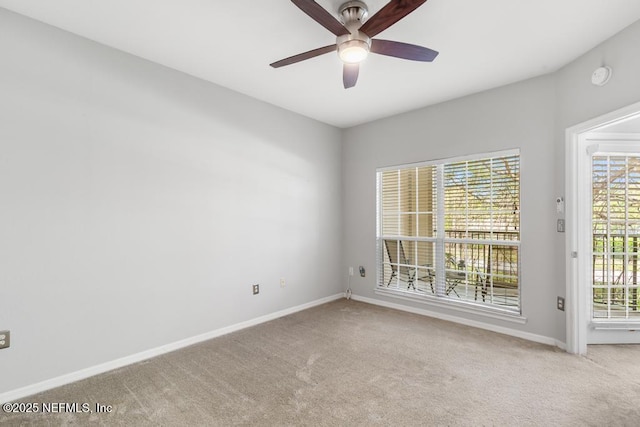 7800 Point Meadows Dr Unit 123, Jacksonville, FL 32256 - empty room with baseboards, a ceiling fan, and carpet