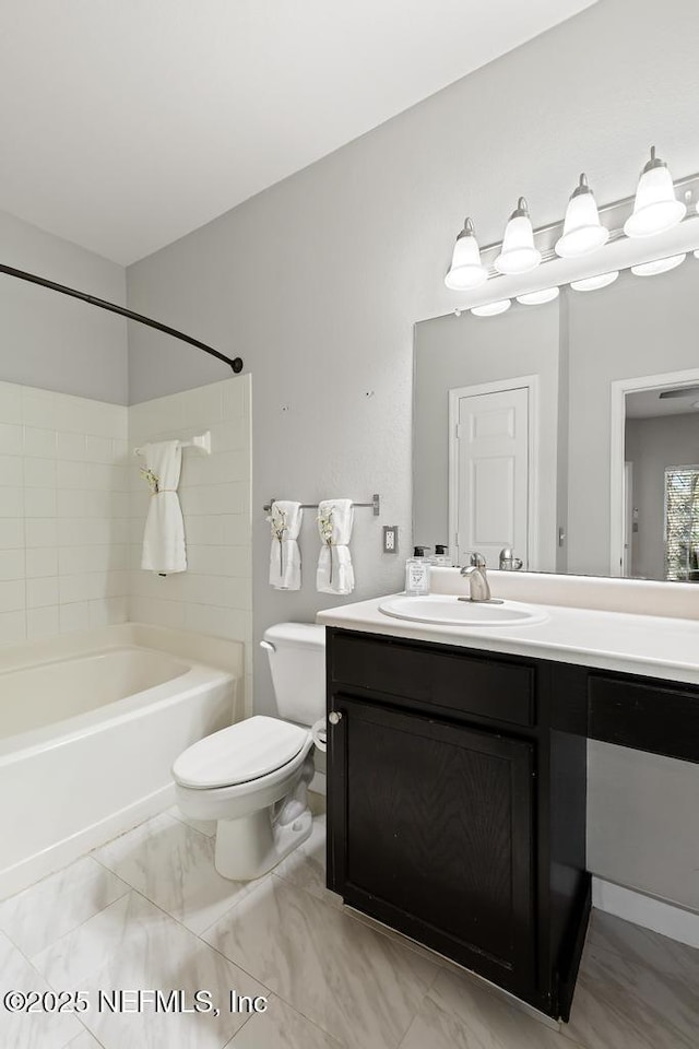 7800 Point Meadows Dr Unit 123, Jacksonville, FL 32256 - bathroom featuring toilet, vanity, and shower / bathtub combination