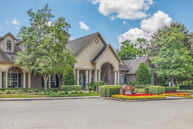 7800 Point Meadows Dr Unit 123, Jacksonville, FL 32256 - view of front of house with brick siding