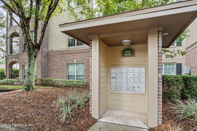 7800 Point Meadows Dr Unit 123, Jacksonville, FL 32256 - view of exterior entry with brick siding