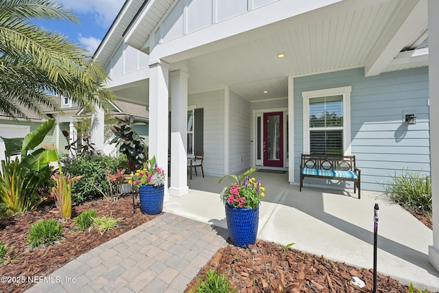 property entrance with covered porch