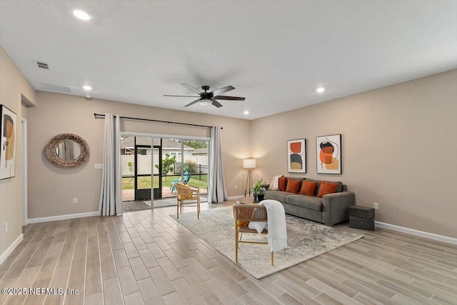 270 King George Ave, Saint Augustine, FL 32092 - living room featuring light wood-type flooring, ceiling fan, and baseboards