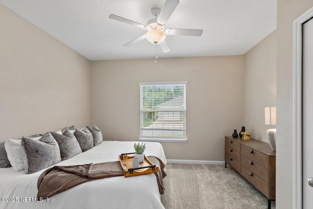 270 King George Ave, Saint Augustine, FL 32092 - bedroom featuring baseboards, ceiling fan, and light colored carpet