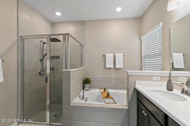 270 King George Ave, Saint Augustine, FL 32092 - full bath with a stall shower, a garden tub, vanity, and recessed lighting