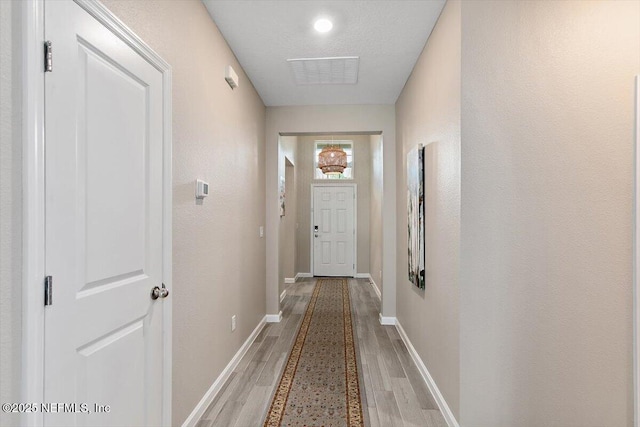 270 King George Ave, Saint Augustine, FL 32092 - entryway with visible vents, baseboards, and light wood finished floors