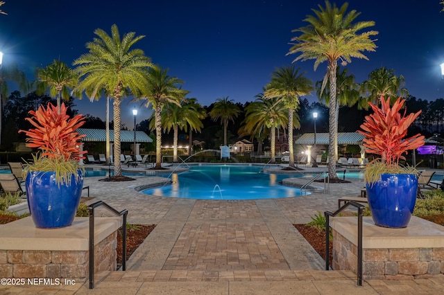 270 King George Ave, Saint Augustine, FL 32092 - pool at twilight with a patio and a community pool