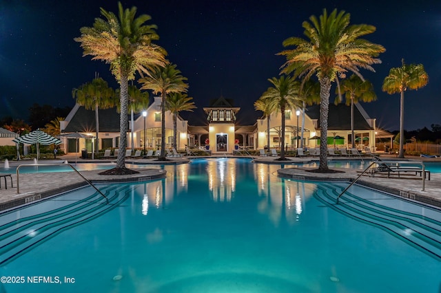 270 King George Ave, Saint Augustine, FL 32092 - pool at night featuring a patio and a community pool