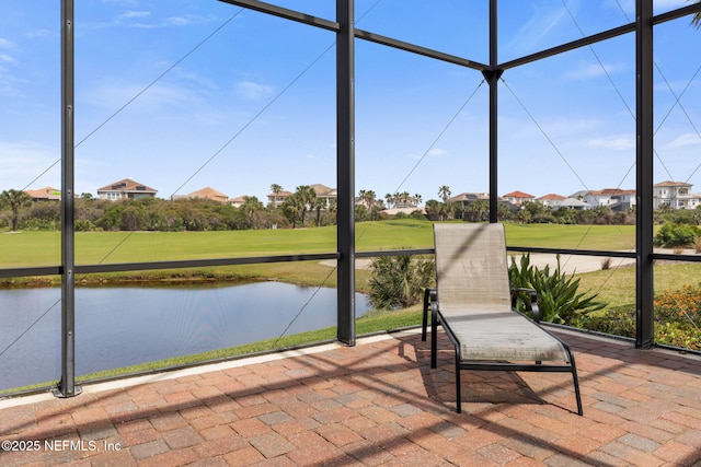 9 Cypresswood Dr, Palm Coast, FL 32137 - unfurnished sunroom with a water view