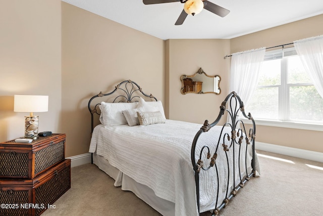 9 Cypresswood Dr, Palm Coast, FL 32137 - carpeted bedroom featuring baseboards and ceiling fan