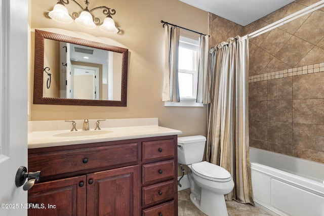 9 Cypresswood Dr, Palm Coast, FL 32137 - full bathroom featuring tile patterned floors, toilet, vanity, shower / bath combo with shower curtain, and visible vents