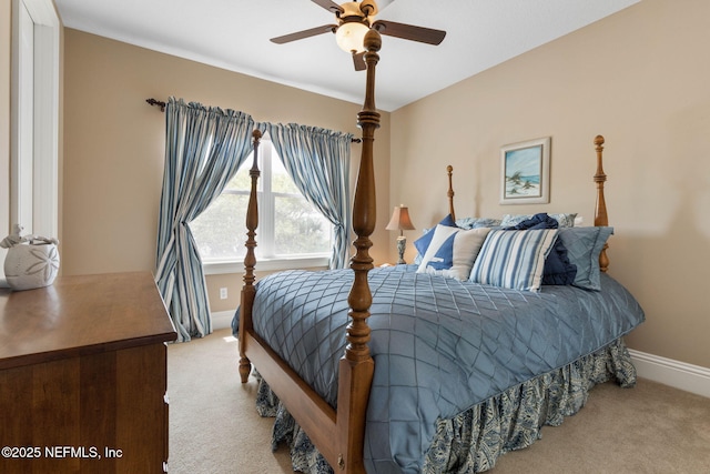 9 Cypresswood Dr, Palm Coast, FL 32137 - carpeted bedroom with baseboards and a ceiling fan