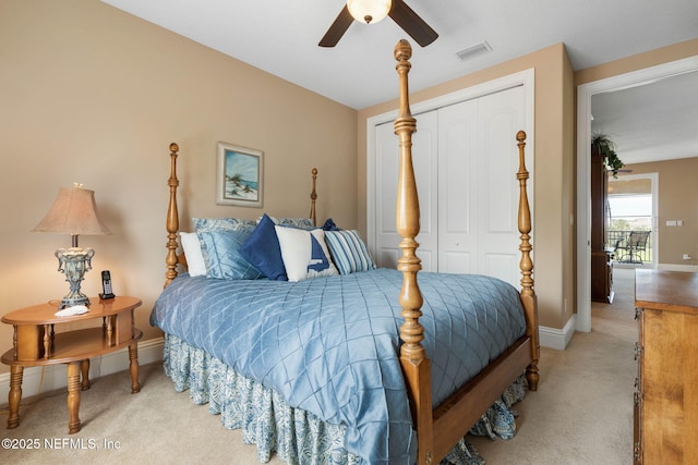 9 Cypresswood Dr, Palm Coast, FL 32137 - bedroom with light carpet, baseboards, a closet, and visible vents