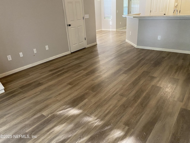 8550 Argyle Business Loop Unit 1308, Jacksonville, FL 32244 - spare room featuring baseboards and dark wood finished floors
