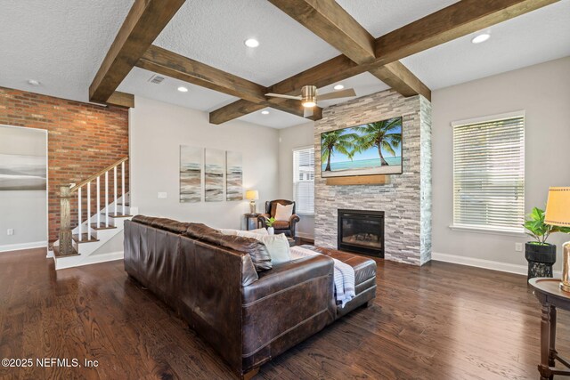 211 Bronson Pkwy, Saint Augustine, FL 32095 - living room with a textured ceiling, beam ceiling, stairs, and wood finished floors