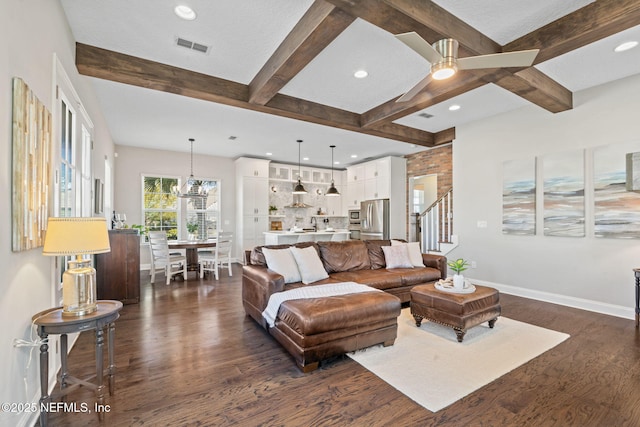 211 Bronson Pkwy, Saint Augustine, FL 32095 - living room featuring dark wood-style floors, beamed ceiling, ceiling fan with notable chandelier, and baseboards