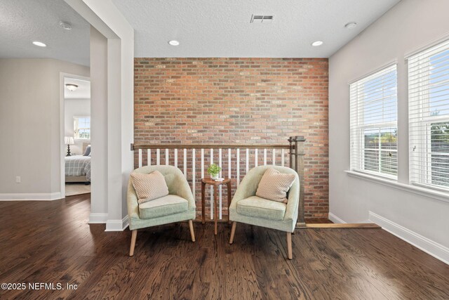 211 Bronson Pkwy, Saint Augustine, FL 32095 - sitting room featuring wood finished floors, plenty of natural light, and visible vents