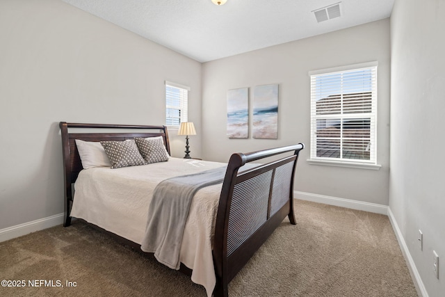 211 Bronson Pkwy, Saint Augustine, FL 32095 - bedroom featuring carpet flooring, baseboards, and visible vents