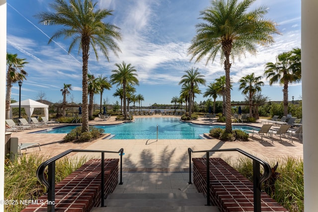 211 Bronson Pkwy, Saint Augustine, FL 32095 - community pool featuring a gazebo and a patio area