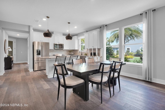 101 Glenhurst Ave, Ponte Vedra, FL 32081 - dining room featuring baseboards, visible vents, wood finished floors, and recessed lighting