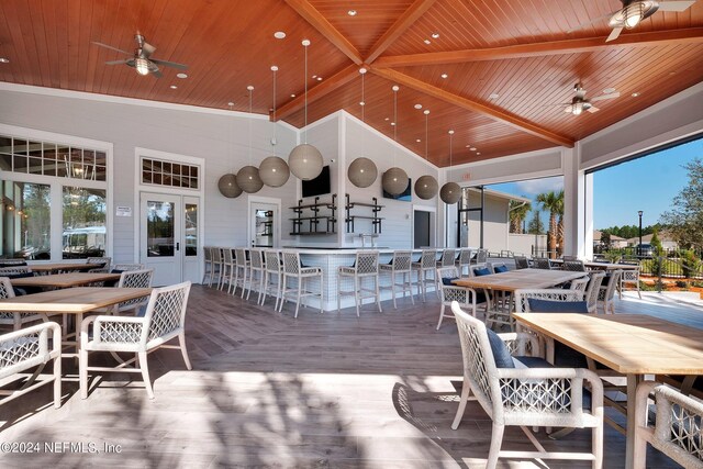 101 Glenhurst Ave, Ponte Vedra, FL 32081 - wooden deck featuring french doors, a ceiling fan, outdoor wet bar, and outdoor dining space