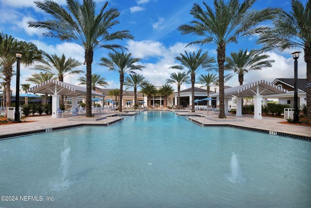 101 Glenhurst Ave, Ponte Vedra, FL 32081 - community pool with a pergola and a patio area