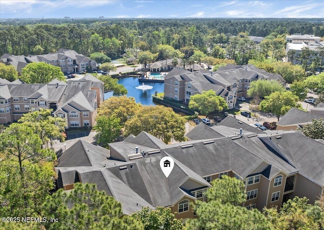 aerial view featuring a water view and a residential view