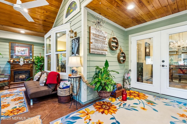 sunroom / solarium featuring french doors