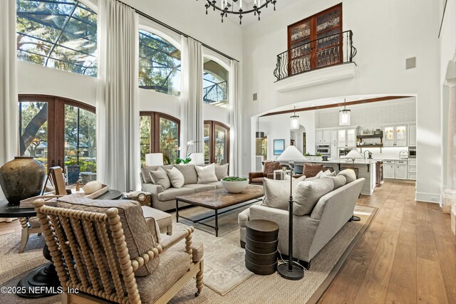 113 Cutter Ct, Ponte Vedra Beach, FL 32082 - living room with plenty of natural light, a high ceiling, and light wood finished floors