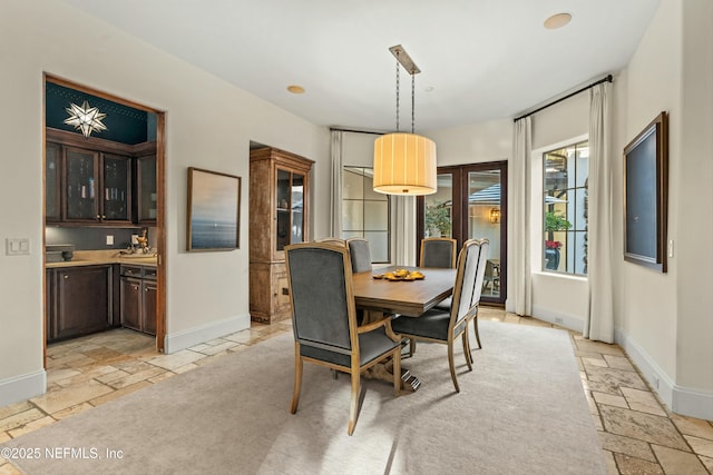 113 Cutter Ct, Ponte Vedra Beach, FL 32082 - dining room featuring baseboards and stone tile floors