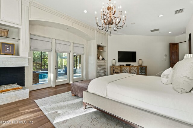 113 Cutter Ct, Ponte Vedra Beach, FL 32082 - bedroom featuring visible vents, wood finished floors, an inviting chandelier, access to outside, and recessed lighting