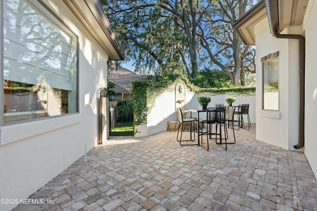 113 Cutter Ct, Ponte Vedra Beach, FL 32082 - view of patio with a fenced backyard and outdoor dining area