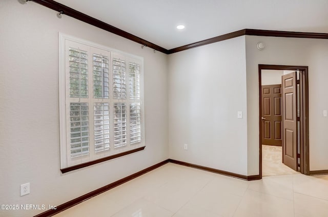 8539 Gate Pkwy W Unit 1121, Jacksonville, FL 32216 - spare room featuring baseboards, ornamental molding, and light tile patterned floors