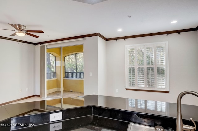 8539 Gate Pkwy W Unit 1121, Jacksonville, FL 32216 - kitchen featuring a ceiling fan, ornamental molding, and recessed lighting