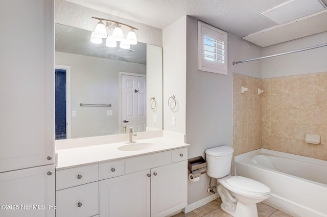 8539 Gate Pkwy W Unit 1121, Jacksonville, FL 32216 - bathroom featuring a textured ceiling, toilet, vanity, shower / bath combination, and tile patterned flooring