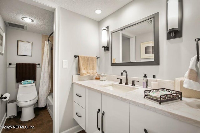 full bathroom with a textured ceiling, visible vents, toilet, tile patterned floors, and vanity