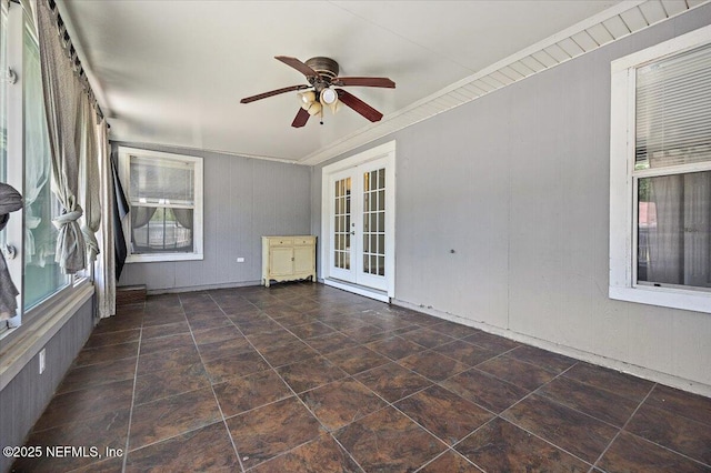 unfurnished sunroom with french doors