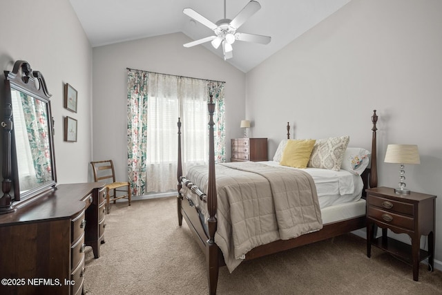 carpeted bedroom featuring multiple windows, vaulted ceiling, and ceiling fan