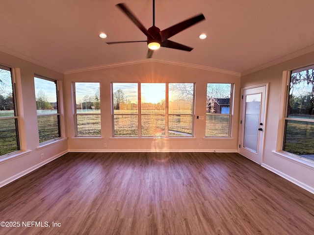 unfurnished sunroom with lofted ceiling, crown molding, wood finished floors, and a deck