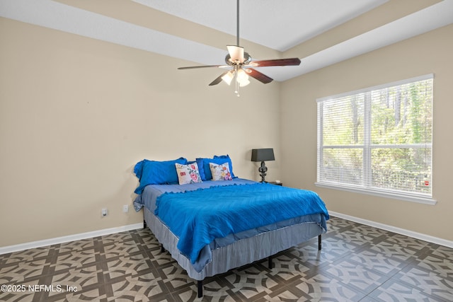 bedroom with baseboards and ceiling fan