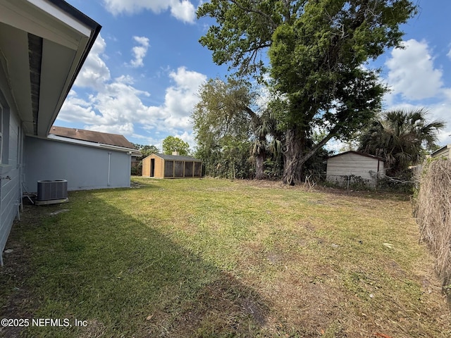 5521 Sabena Rd, Jacksonville, FL 32207 - view of yard featuring a storage shed, central AC unit, and an outdoor structure