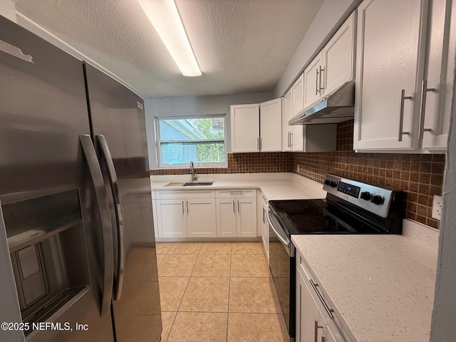5521 Sabena Rd, Jacksonville, FL 32207 - kitchen featuring a sink, white cabinetry, stainless steel appliances, and under cabinet range hood