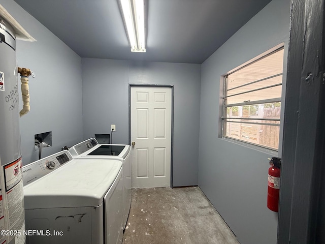 5521 Sabena Rd, Jacksonville, FL 32207 - washroom featuring water heater, laundry area, and independent washer and dryer
