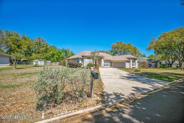 388 Lolly Ln, Saint Johns, FL 32259 - single story home with an attached garage, driveway, and a front yard