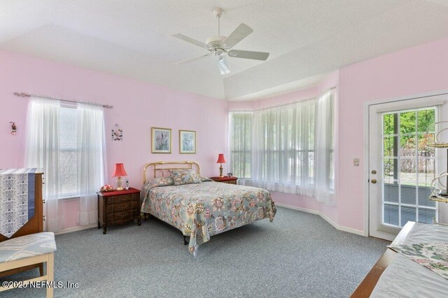 388 Lolly Ln, Saint Johns, FL 32259 - carpeted bedroom with access to outside, ceiling fan, baseboards, and lofted ceiling